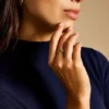 Anillo Heritage D-Link de acero inoxidable en tono dorado