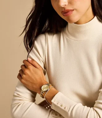 Conjunto de reloj y pulsera Carlie de acero inoxidable dorado con tres agujas