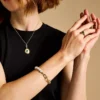 Pulsera Heritage Pearl D-Link de acero inoxidable dorado