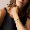 Pulsera Sutton con corazón de acero inoxidable dorado Pulsera Sutton con corazón de acero inoxidable dorado