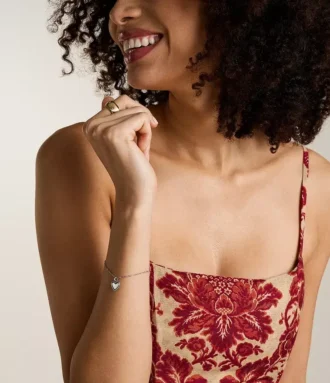 Pulsera Sutton Legacy Heart de acero inoxidable con cadena giratoria