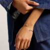 Pulsera tipo esclava Sutton Pavé Butterfly en acero inoxidable dorado