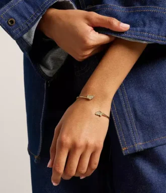 Pulsera tipo esclava Sutton Pavé Butterfly en acero inoxidable dorado