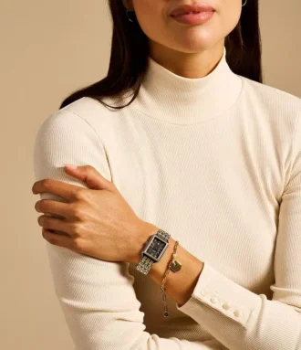 Raquel Reloj y brazalete de acero inoxidable bicolor con tres agujas y fecha Raquel Reloj y brazalete de acero inoxidable bicolor con tres agujas y fecha