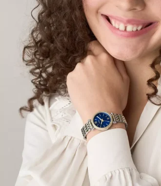 Reloj Carlie de acero inoxidable bicolor con tres agujas