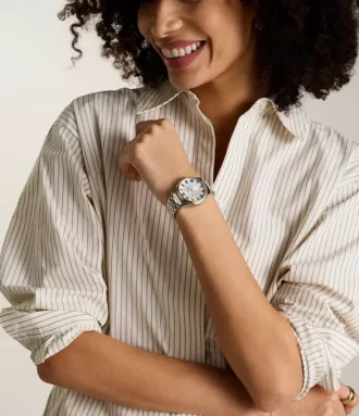 Reloj Gilmore de acero inoxidable bicolor con tres agujas y fecha