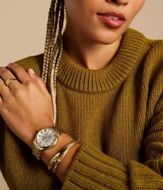 Reloj Gilmore de acero inoxidable dorado con tres agujas y fecha