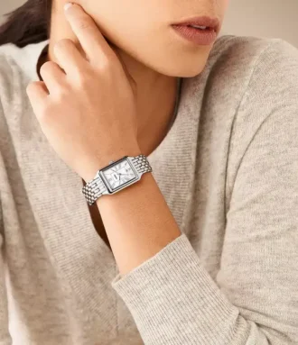 Reloj Raquel de acero inoxidable con tres agujas y fecha