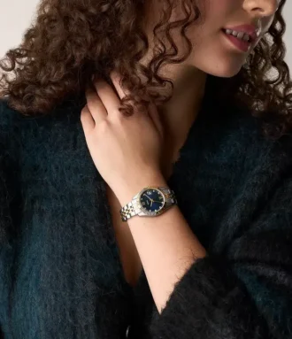 Reloj Scarlette de acero inoxidable bicolor con tres agujas